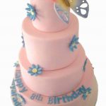 4 tier pink with blue flowers